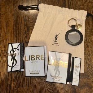 Yves Saint Laurent Black and Gold Keychain, matching pouch with Perfume samples